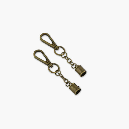 Two Tassel Caps with Swivel