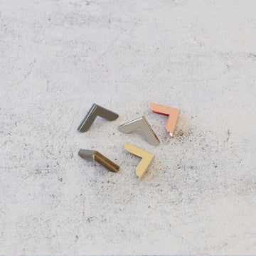 Ten 3/4" Metal Corners